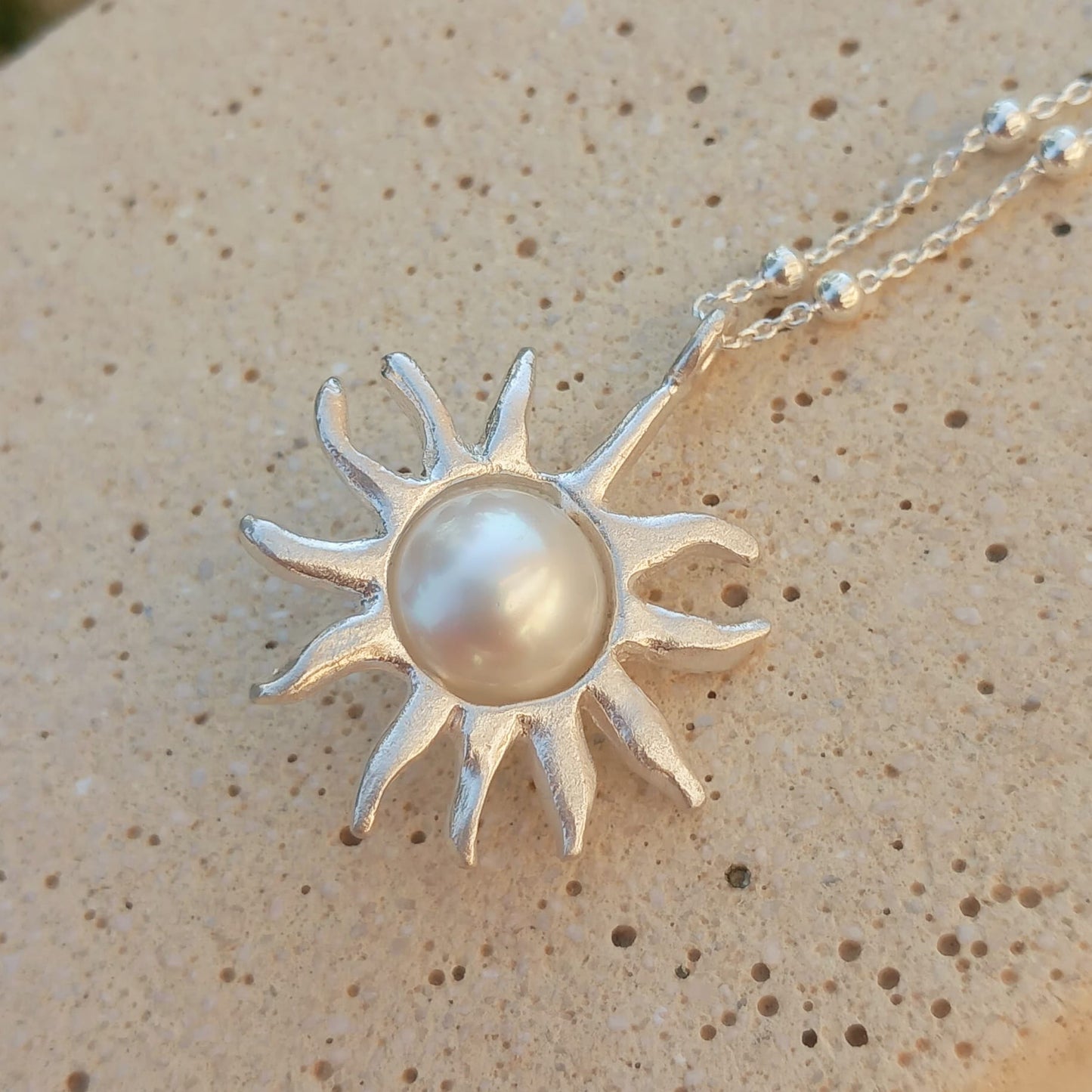 Nucleo (argento e perla giapponese)