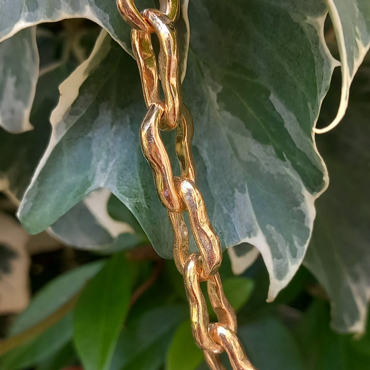 Unda (ottone dorato e argento)