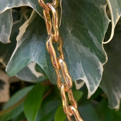 Unda (ottone dorato e argento)